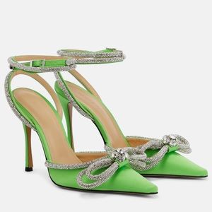 MACH & MACH
Crystal-embellished silk pumps